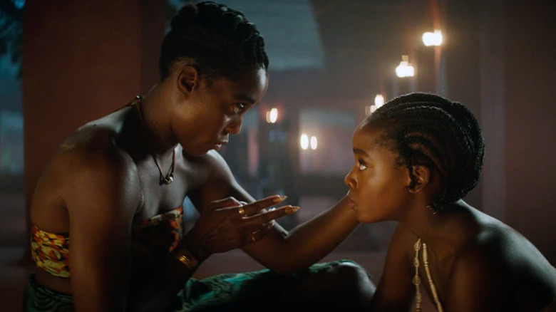 Lashana Lynch as Izogie and Thuso Mbedu as Nawi in The Woman King