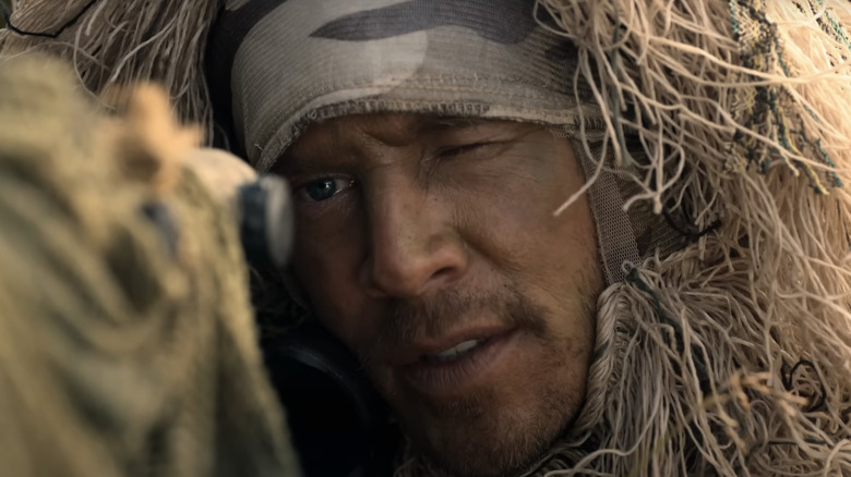 Chad Michael Collins Brandon Picky looks at the bottom of the gun barrier in the last snipers