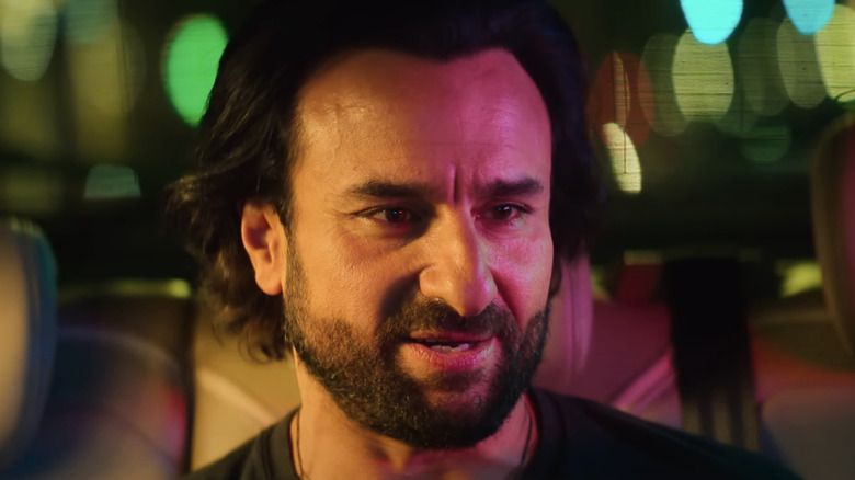 Saif Ali Khan as Rehan Roy sits in the back of a car in Jewel Thief - The Heist Begins