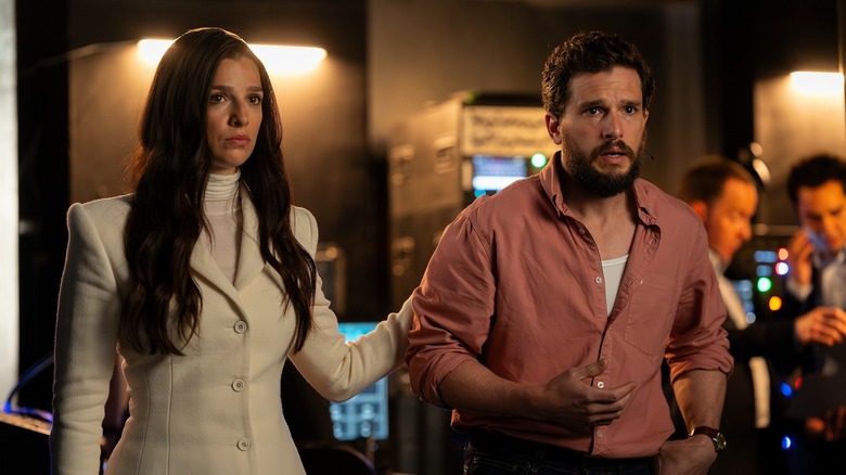 Yasmin with her hand on a freaked out Henry's back on Industry