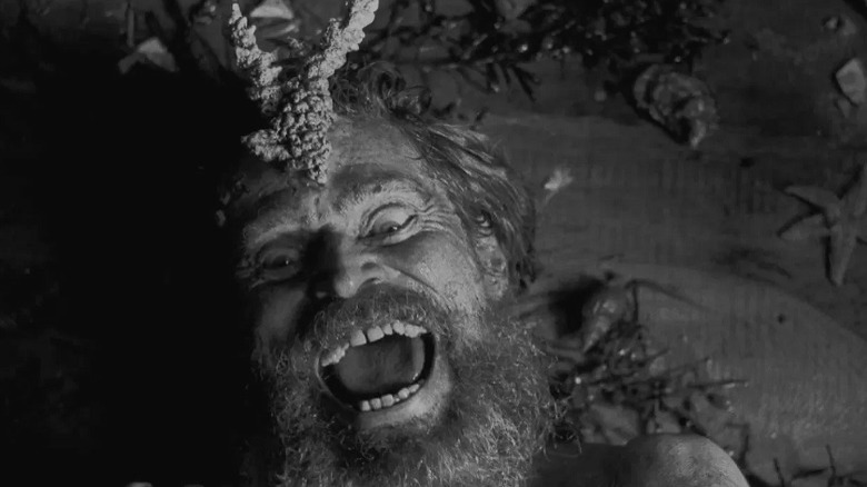 William Dafoe coated in coral