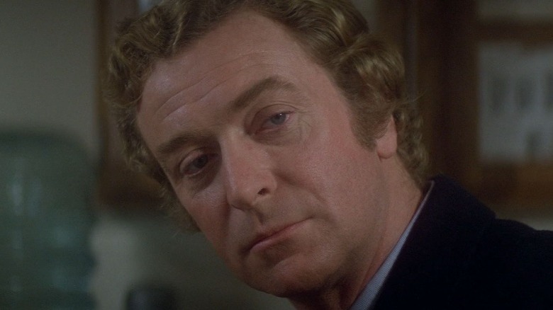 Michael Caine tilted head