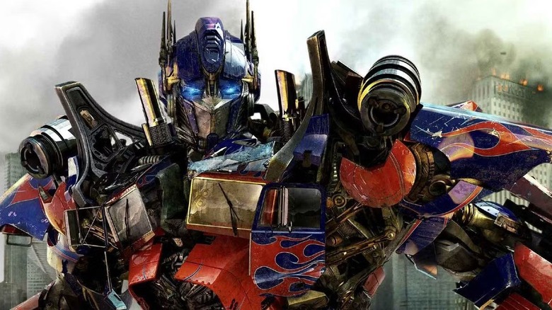 Optimus Prime sniffing the humans