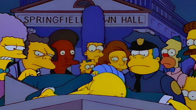 Crowd gathers around Mr. Burns