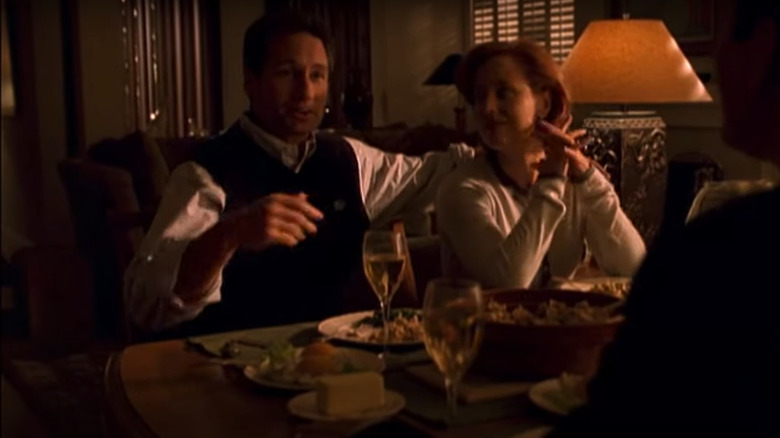 Mulder and Scully eating dinner