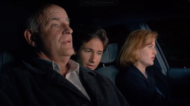 Mulder, Scully, and Bruckman in car