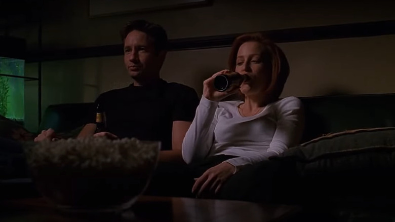 Agents Mulder and Scully drinking