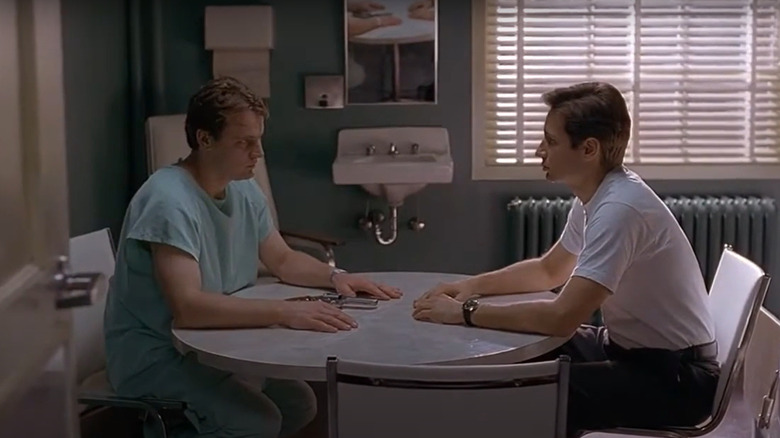 Agent Mulder interrogating Modell