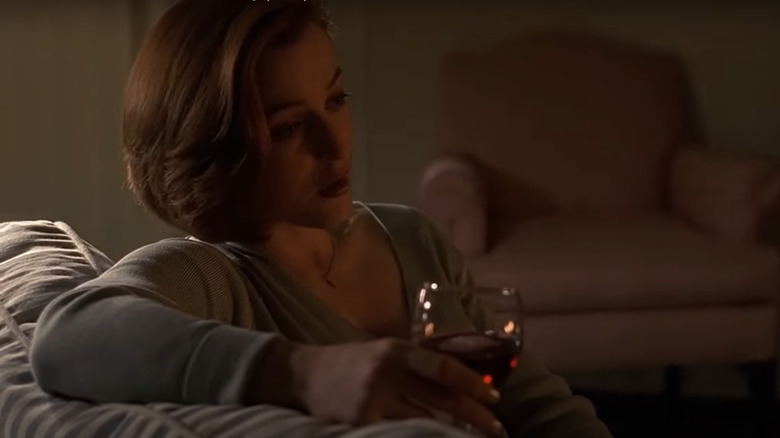 Agent Scully drinking wine