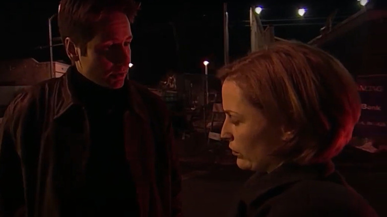 Agents Mulder and Scully outside