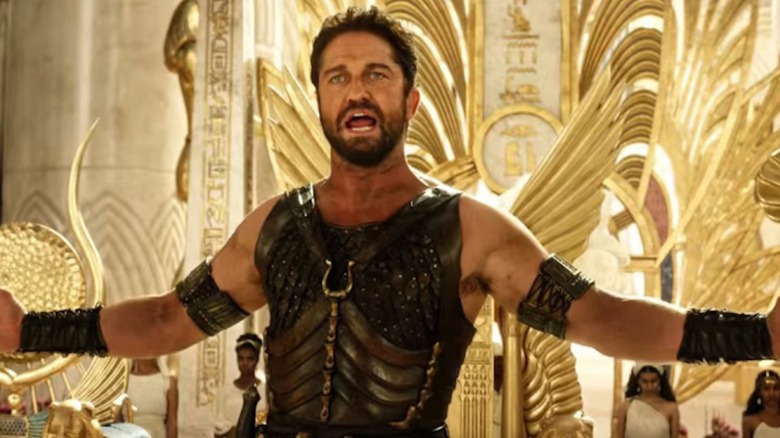 Set (Gerard Butler) doesn't actually care if we're entertained as he stands, proudly, amidst too much gold in Gods of Egypt