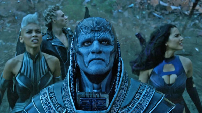 Oscar Isaac's Apocalypse stands in front of X-Men Storm, Archangel, and Psylocke in Age of Apocalypse