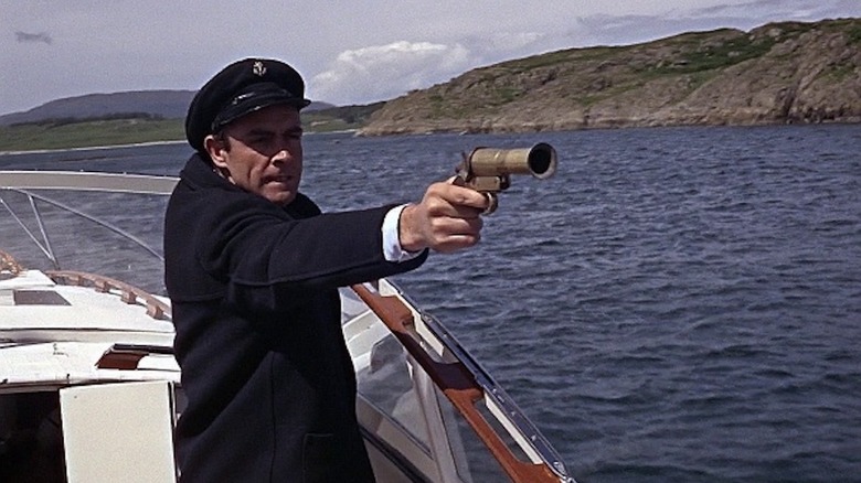 Sean Connery prepares to fire a flare as James Bond in From Russia with Love