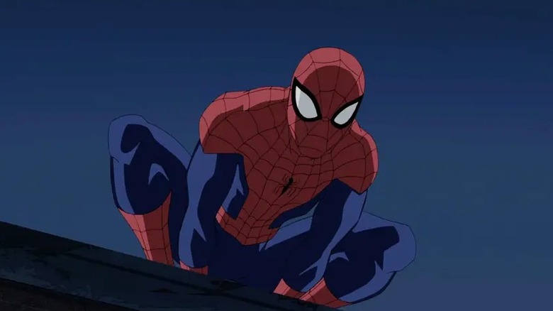 Close-up of Spider-Man crouching on a rooftop in the cartoon Ultimate Spider-Man (2012)