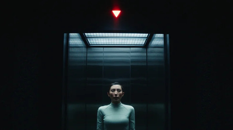Dichen Lachman's Gemma Scout in an elevator on Severance
