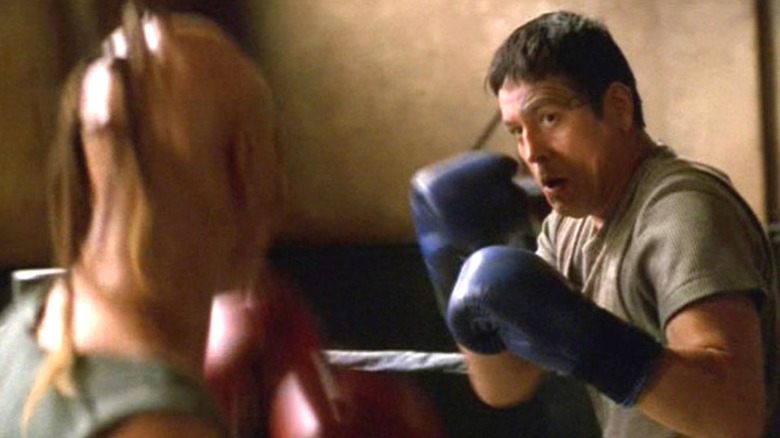 Chakotay boxing with an alien on Star Trek: Voyager