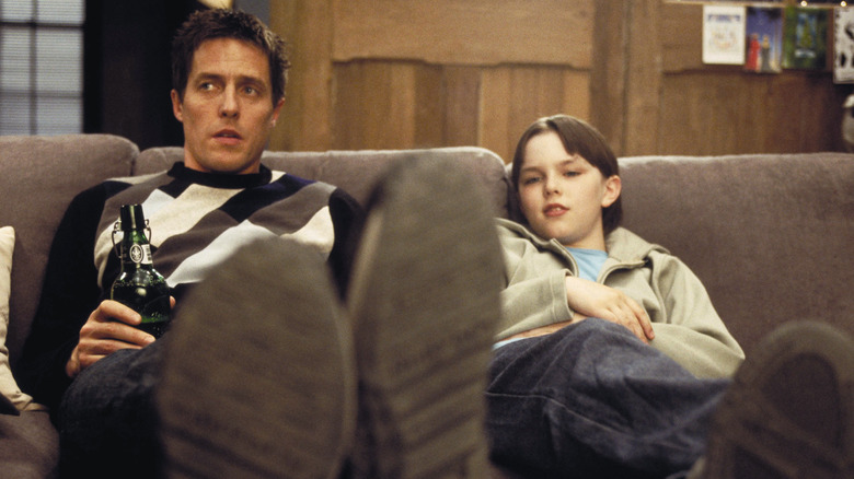 Grant and Hoult on couch