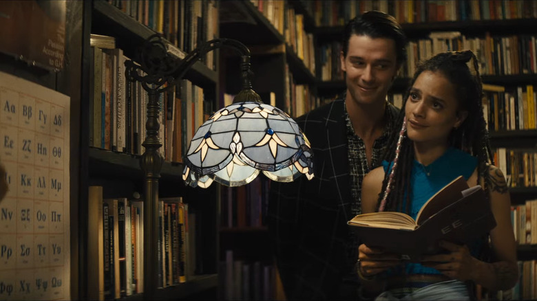 Schwarzenegger and Sasha Lane in library