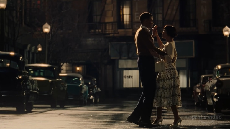 Thompson and Asomugha dance in street