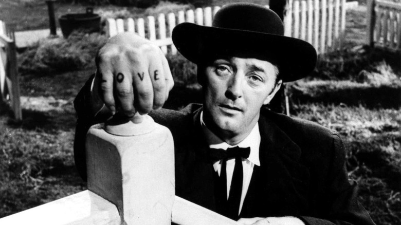 Mitchum with hand tattoos