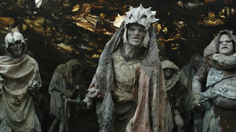 orcs scowling helmets loose clothing