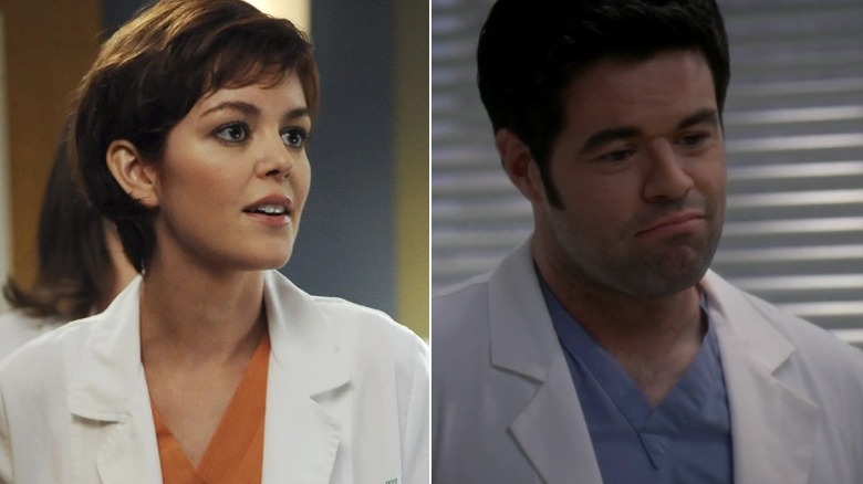 Dr. Reed Adamson (Nora Zehetner) in orange scrubs and a white coat and Dr. Charles Percy (Robert Baker) smirking