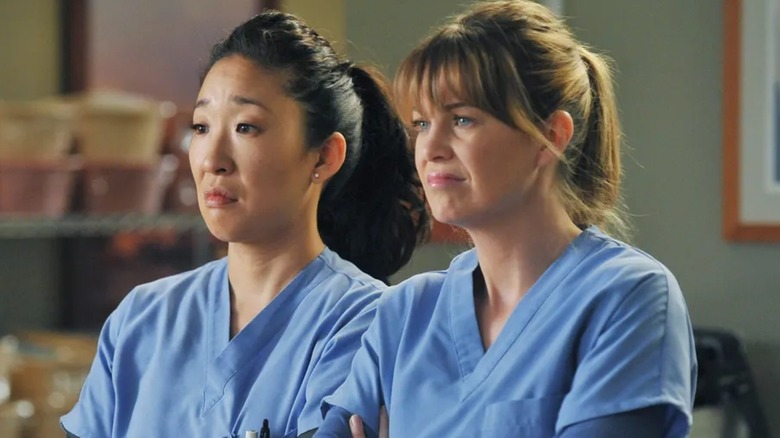 Cristina (Sandra Oh) and Meredith (Ellen Pompeo) looking confused on Grey's Anatomy