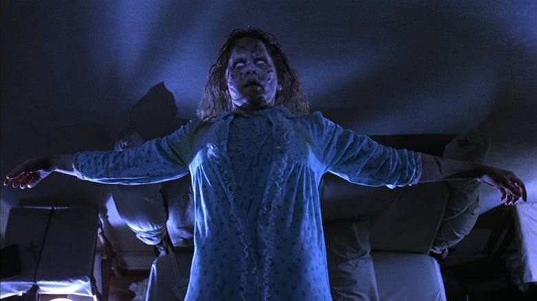 Linda Blair as Regan floating above her bed while possessed in The Exorcist