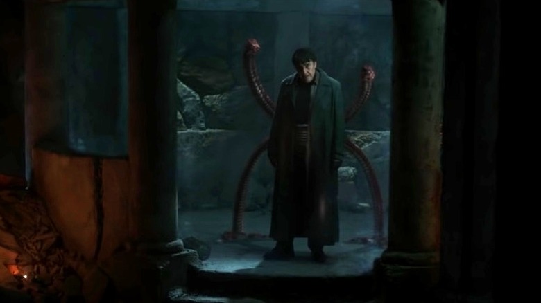 Doc Ock addresses Peter from a cage