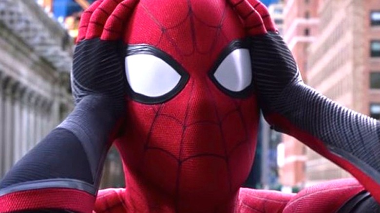 The MCU Spider-Man holds his head in worry