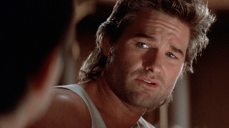 Kurt Russell as Jack Burton cocking his head in Big Trouble in Little China