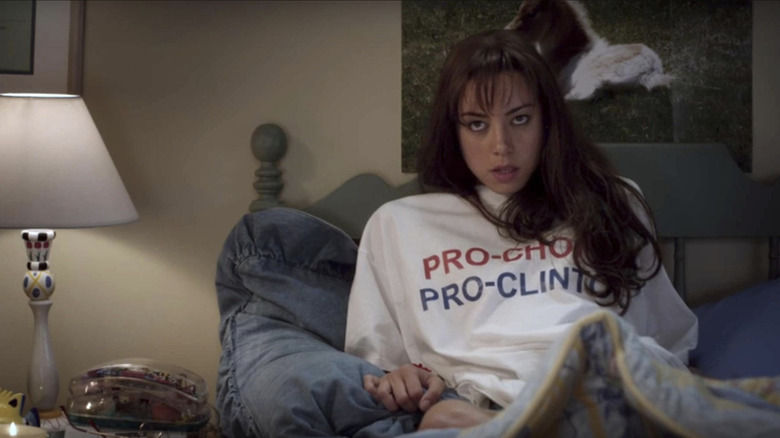 Aubrey Plaza as Brandy Klark in The To-Do List wearing a 'pro-choice, pro-Clinton' t-shirt.