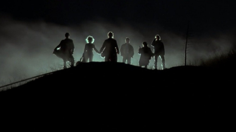 Vampires standing on hill in Near Dark