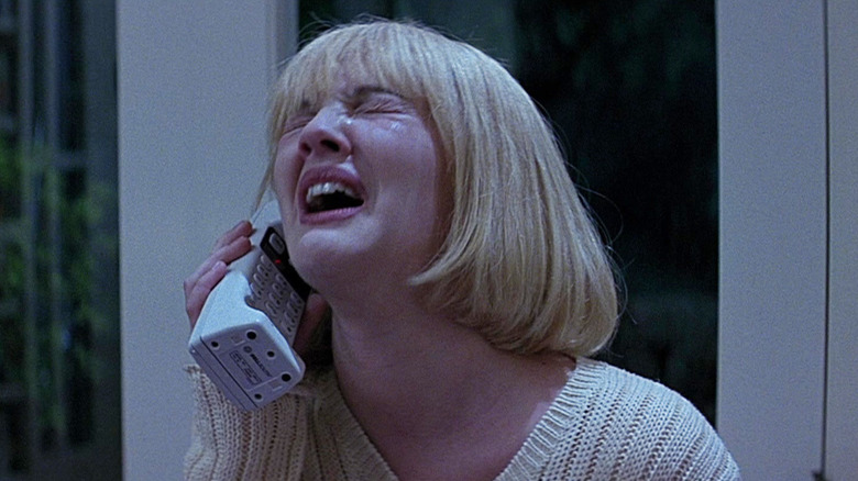 Drew Barrymore as Casey crying on the phone in Scream (1996)