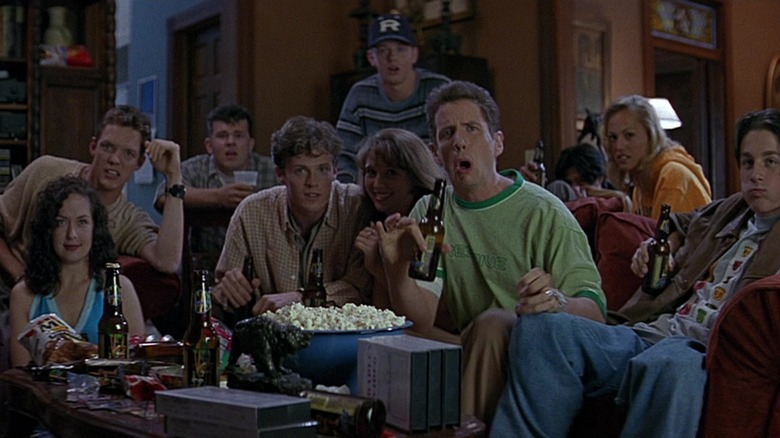 A group of teens gather to watch a scary movie in Scream