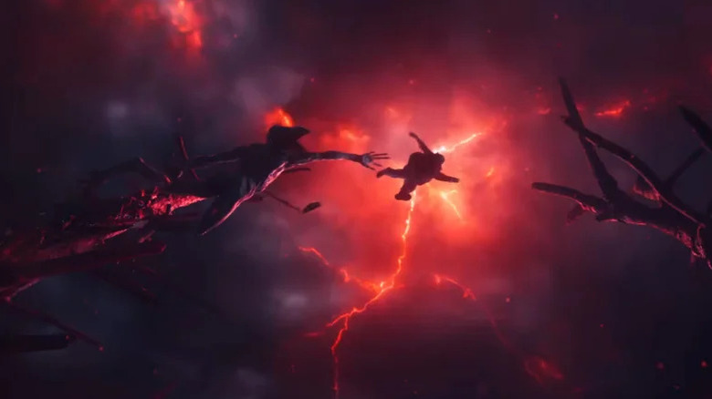 A demogorgon chasing Noah Schnapp as Will Byers in the treetops on Stranger Things