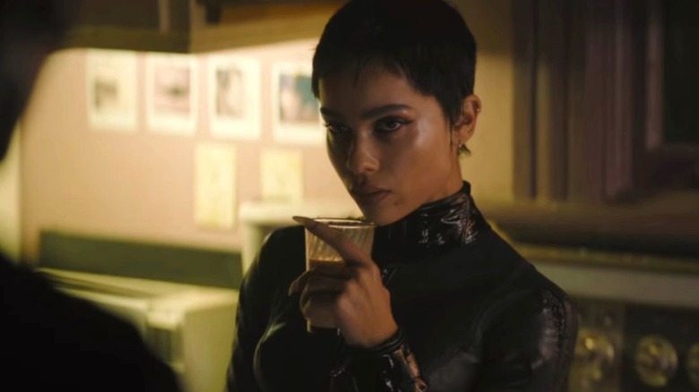 Selina holds cup