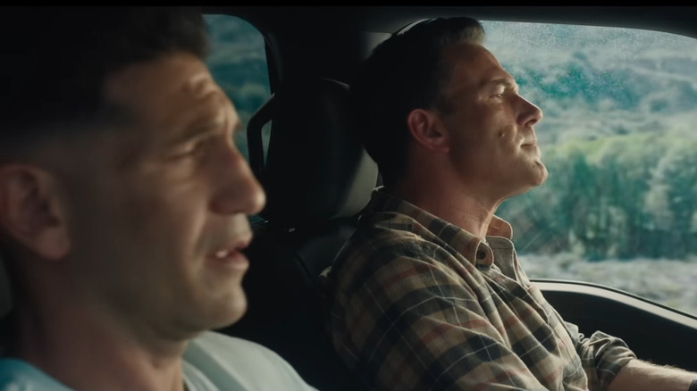 Braxton and Christian riding in a car in The Accountanf 2