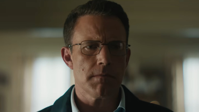 Christian Wolff looking at a wall in The Accountant 2