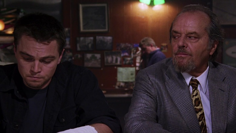 Leonardo DiCaprio's William Costigan and Jack Nicholson's Frank Costello sit side by side in The Departed