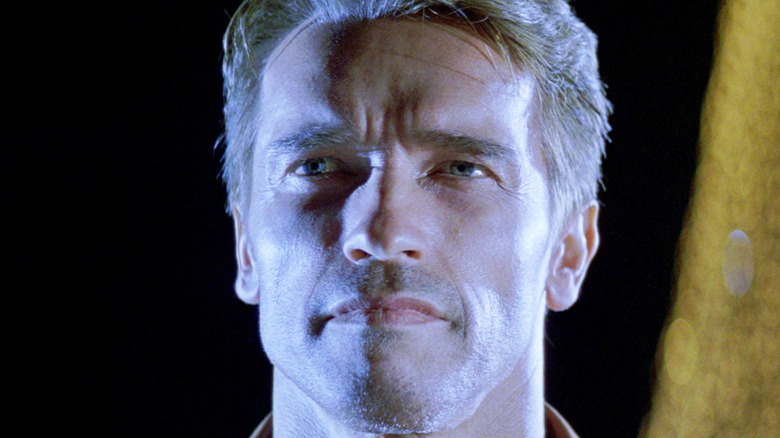 Arnold Schwarzenegger as Jack Slater looks serious in Last Action Hero