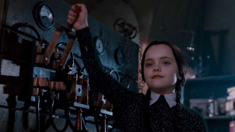 Wednesday Addams pulling lever