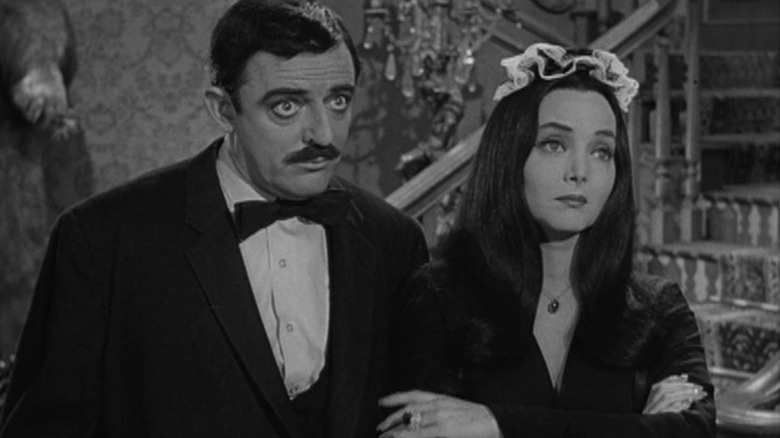 Gomez and Morticia looking somber on The Addams Family