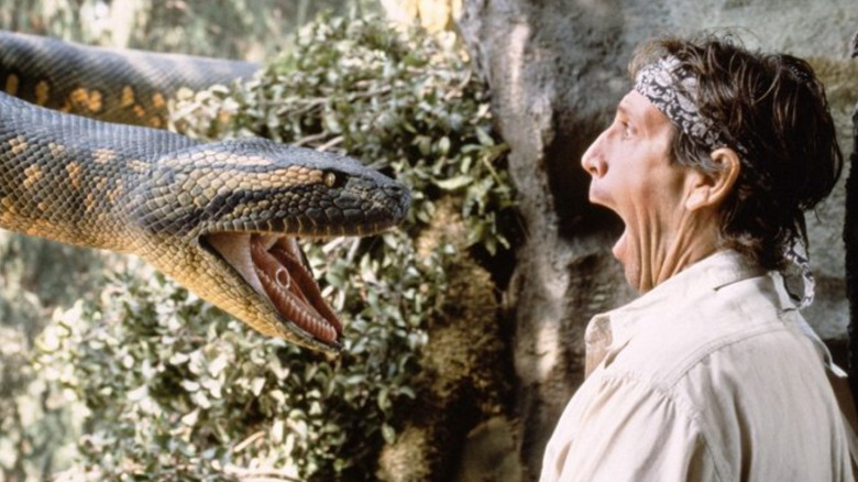 Jonathan Hyde as Westridge screaming as the snake is coming at him in Anaconda (1997)