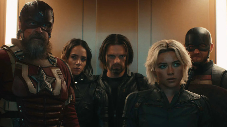 David Harbour as Red Guardian, Hannah John-Kamen as Ghost, Sebastian Stan as Bucky, Florence Pugh as Yelena, and Wyatt Russell as John Walker in an elevator in Thunderbolts*