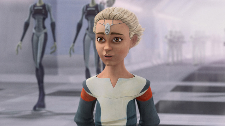 Omega standing in a hallway in Tipoca City on Kamino in Star Wars: The Bad Batch
