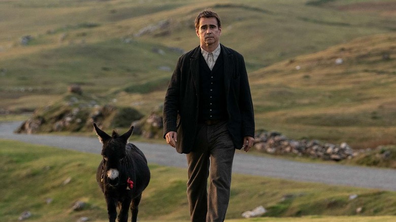 Padraic walks with his donkey Jenny through the fields of Inisherin.