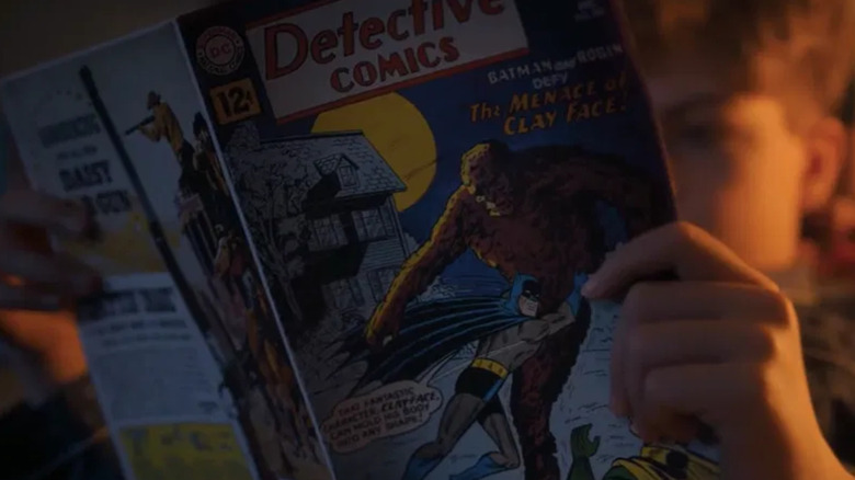 Teddy reading Detective Comics #298 with Batman fighting Clayface on the cover in It: Welcome to Derry