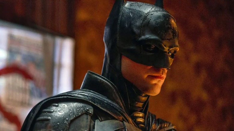 Robert Pattinson as Batman looks dejected during a case in The Batman