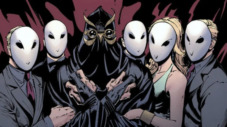 Members of the Court with a Talon in the center in Batman: The Court of Owls